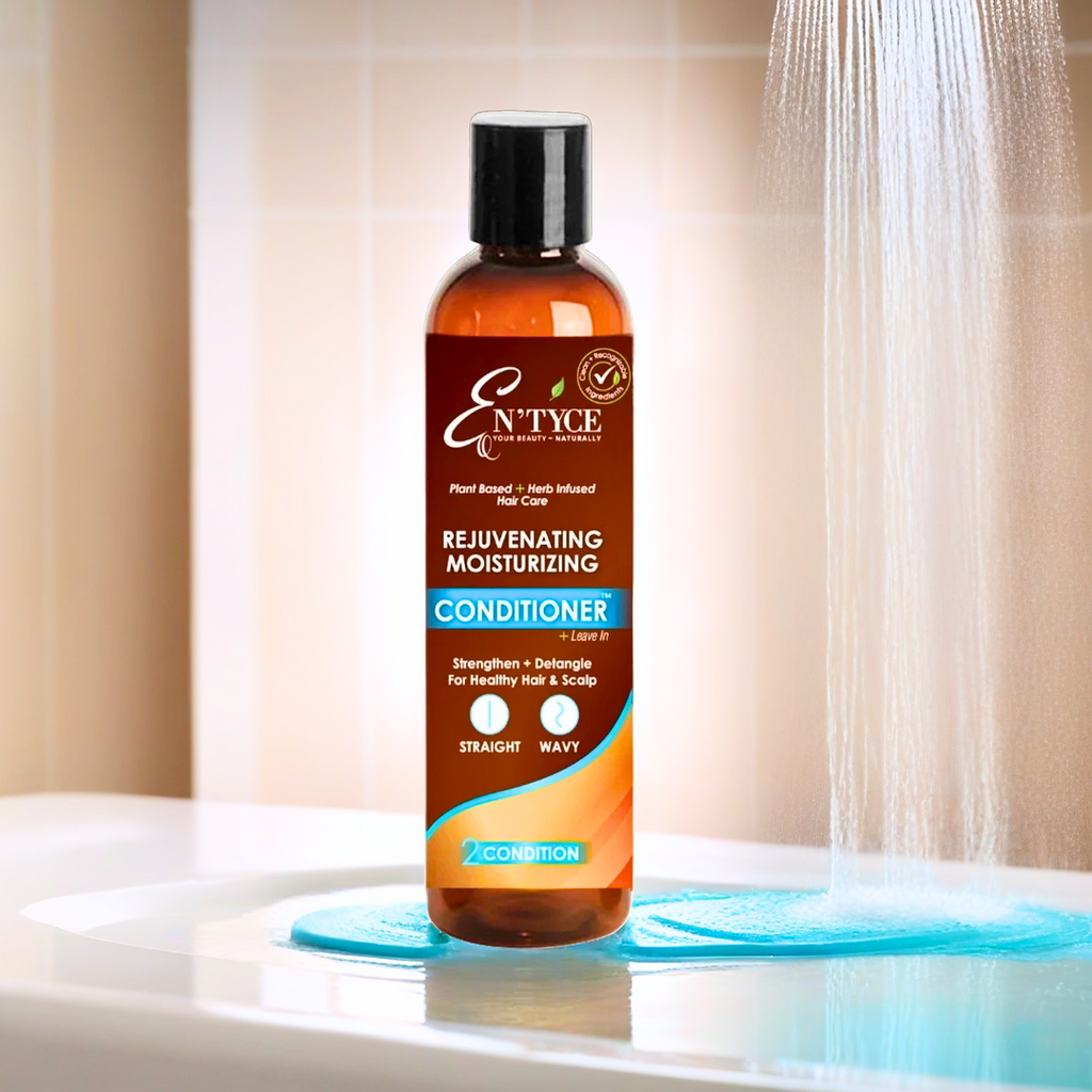 En'yyce Rejuvenating Moisturizing Conditioner bottle on a bathtub ledge with water flowing in the background