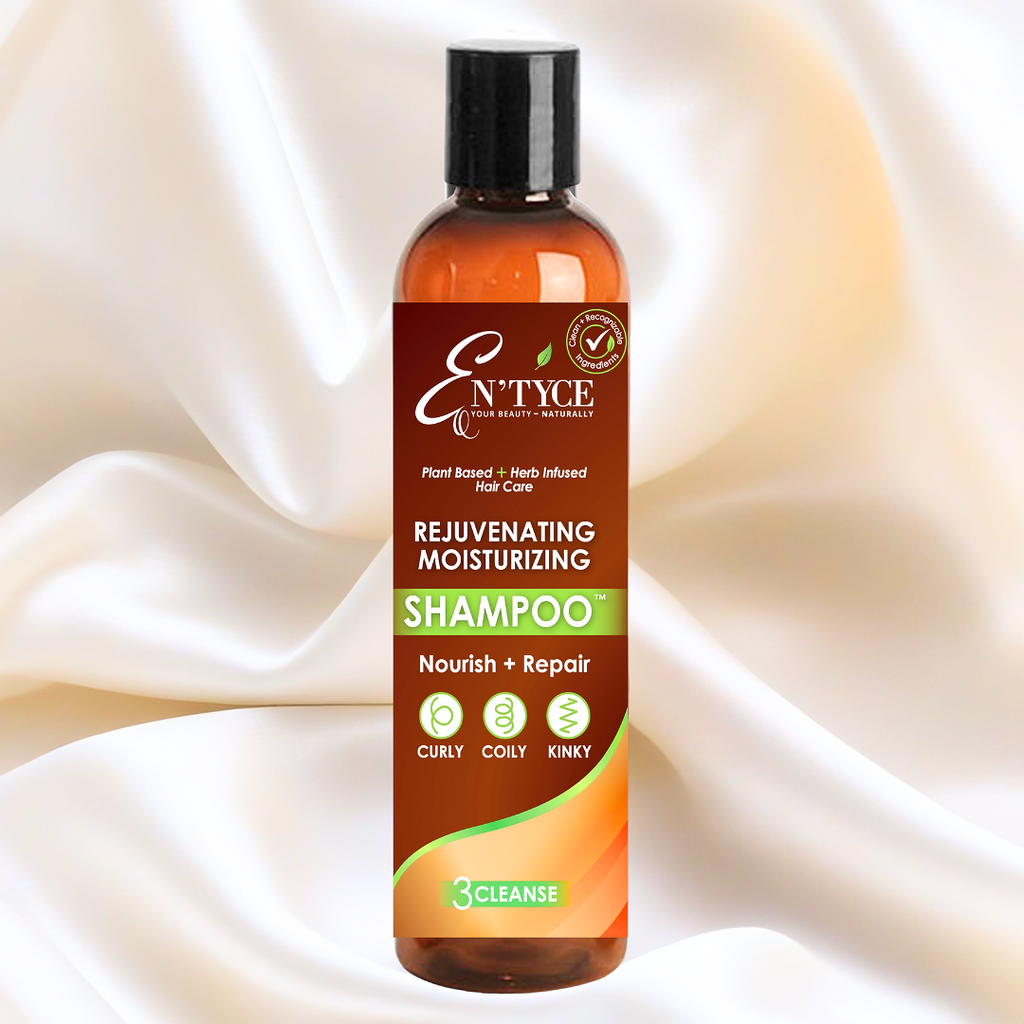 En'tyce shampoo bottle on a beige fabric background